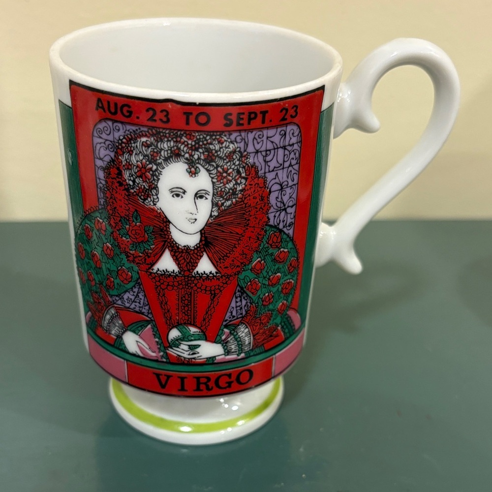 Royal Crown Arnart ‘Smug Mug’ Featuring Virgo Zodiac Sign On A Pedestal Base.